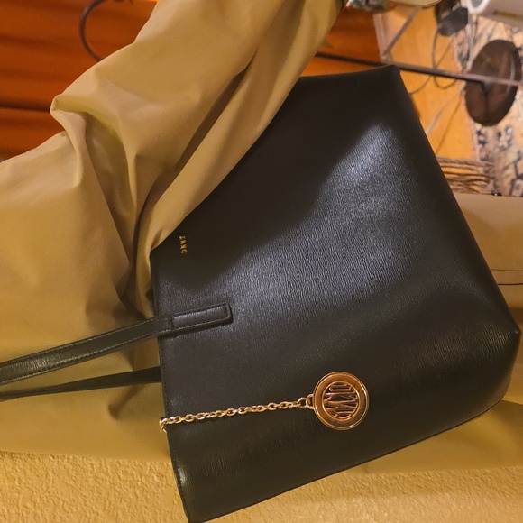 DKNY Bryant Medium Zippered Tote Bag in black leather with gold-tone hardware.  - Picture 17 of 17